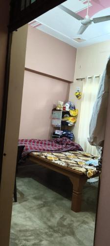 Cama o camas de una habitación en Daya Home Stay 1 km to Sangam Mahakumbh