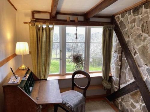 Ένα ή περισσότερα κρεβάτια σε δωμάτιο στο Titoki Downs Farm Stay