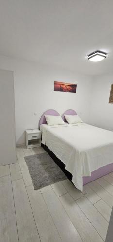 Postel nebo postele na pokoji v ubytování Sab Luxury Apartments