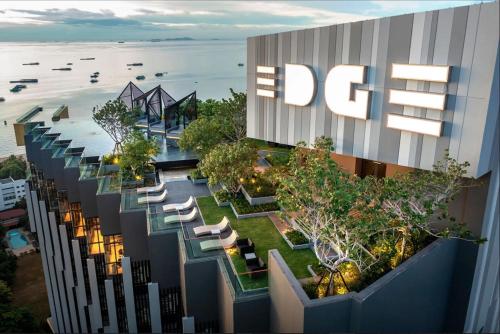 an overhead view of a building with chairs and trees at The Edge central pattaya in Pattaya Central
