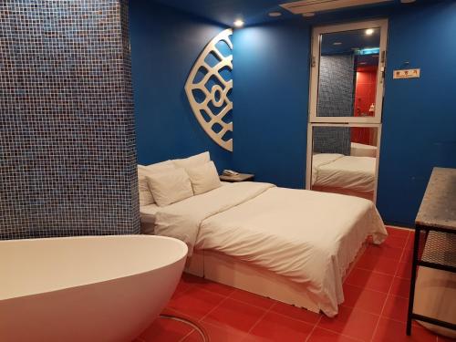 Ένα ή περισσότερα κρεβάτια σε δωμάτιο στο Hotel Star