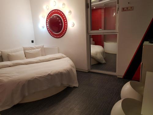 Ένα ή περισσότερα κρεβάτια σε δωμάτιο στο Hotel Star