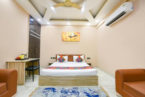 Postel nebo postele na pokoji v ubytování FabHotel Vibe