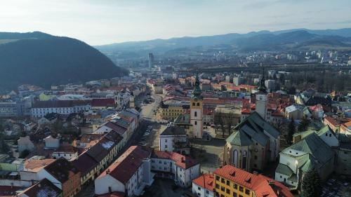an aerial view of a city with buildings at Penzión Grand, Self Check-In, free private parking in Banská Bystrica