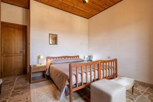 Postel nebo postele na pokoji v ubytování Villa Angelina