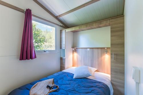 Postel nebo postele na pokoji v ubytování Camping Neptuno