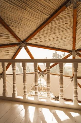 a view from the inside of a building with a wooden ceiling at DAV MAHAL Eco lodge in Sidi Kaouki