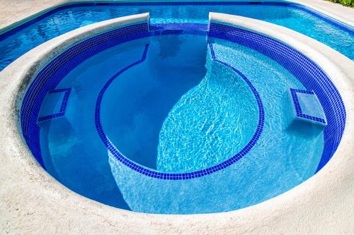 an overhead view of a swimming pool at Dover Beach Hotel in Christ Church
