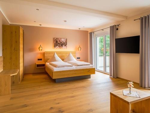 Postel nebo postele na pokoji v ubytování Main-Vinotel Weingut Helmstetter