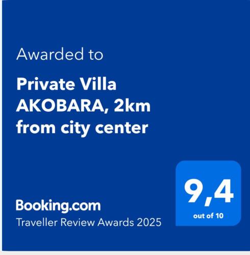 a blue sign that reads awarded to private villa aklanzaza zkm at Private Villa AKOBARA, 2km from city center in Corfu Town