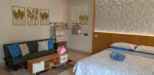 Katil atau katil-katil dalam bilik di SMDC Hill Residences, Unit 601