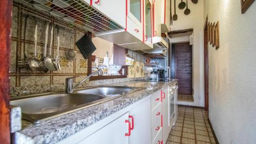 Kuchyň nebo kuchyňský kout v ubytování Villa Rita