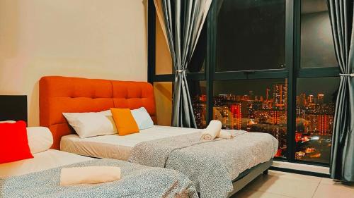 Postel nebo postele na pokoji v ubytování Sea View Condo In Georgetown 10 pax