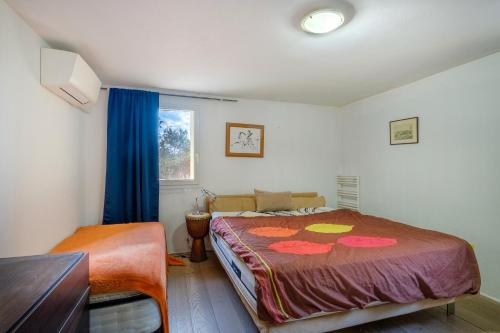 Katil atau katil-katil dalam bilik di Appartement Falicon