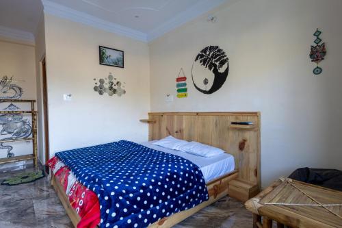 Postel nebo postele na pokoji v ubytování The Corbett Rajae Homestay