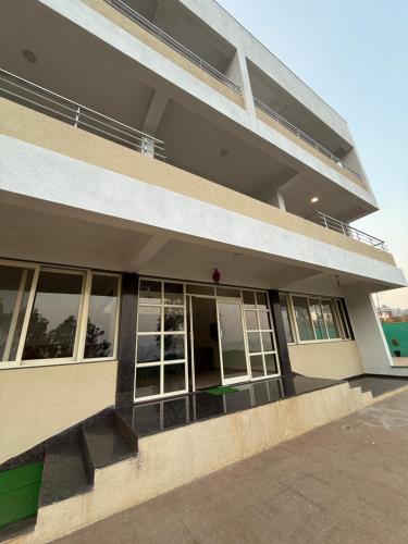 Balkón nebo terasa v ubytování Wonder Mist Resort, Mahabaleshwar