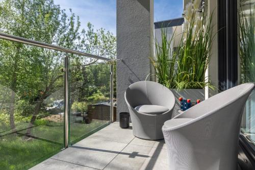 Zahrada ubytování Coast Apartment Close to the Beach with Parking & Balcony by Noclegi Renters