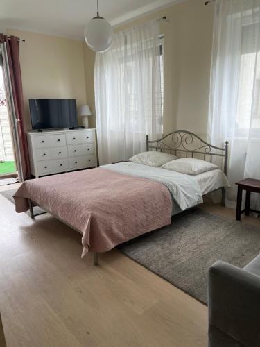 Postel nebo postele na pokoji v ubytování Zielone Studio