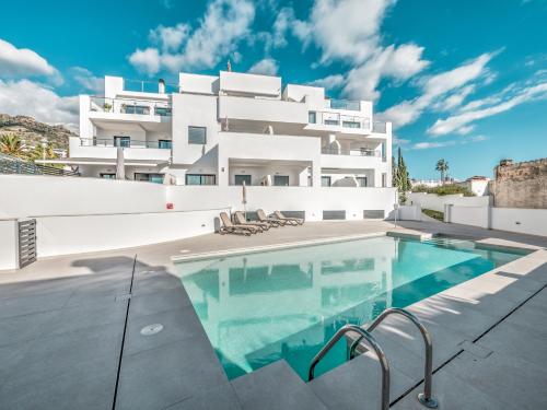 Modern townhouse with 3 terraces, pool and views