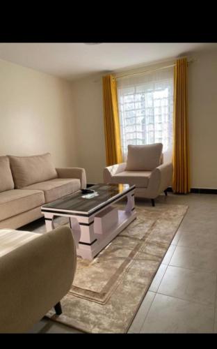 Posezení v ubytování Olive stylish stay 04