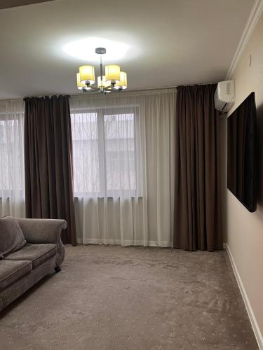 TV a/nebo společenská místnost v ubytování Hotel FN Shymkent