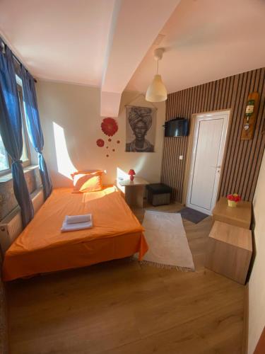 Ένα ή περισσότερα κρεβάτια σε δωμάτιο στο Hotel Forest Star on the Ski Slope
