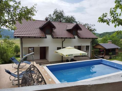 Bazén v ubytování Holiday House Marija nebo v jeho okolí