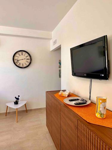 TV a/nebo společenská místnost v ubytování Villa Dolena Marzamemi, Sicilia