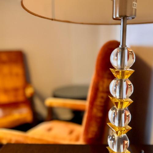 a close up of a table with a lamp at Hotel Zelený dům in Dolní Poustevna