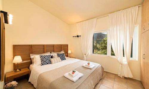 Ένα ή περισσότερα κρεβάτια σε δωμάτιο στο Apple Green Villa Privater Pool