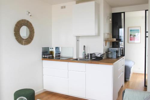 Photo de la galerie de l'établissement Bright apartment with terraces and view, à Boulogne-Billancourt