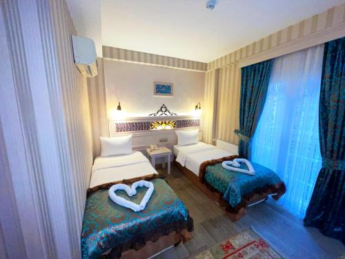 Katil atau katil-katil dalam bilik di Hotel Novano