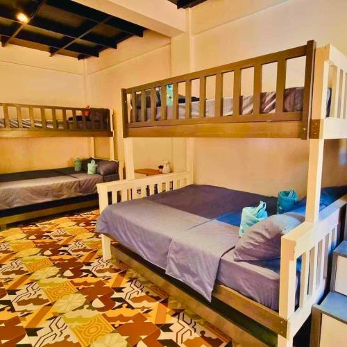 Ένα ή περισσότερα κρεβάτια σε δωμάτιο στο Casa Calungsod in San Juan, La Union