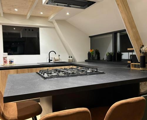 Chalet Du Bois VIにあるキッチンまたは簡易キッチン