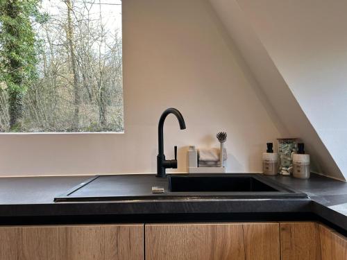 Chalet Du Bois VIにあるキッチンまたは簡易キッチン