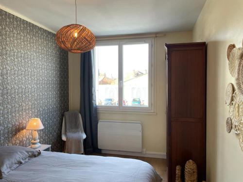 Au coeur de Chantilly, près de Paris et du Parc Astérixにあるベッド
