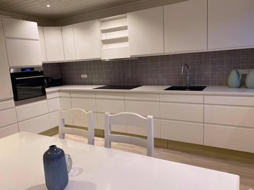 Kuchyň nebo kuchyňský kout v ubytování South Family Hideaway