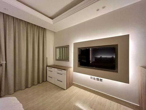 TV a/nebo společenská místnost v ubytování Prestige Hitting Residence