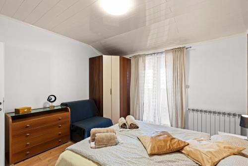 Ένα ή περισσότερα κρεβάτια σε δωμάτιο στο Sea View apartments with shared Pool