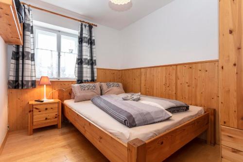 Una cama o camas en una habitación de Ferienhaus Fuchslechner