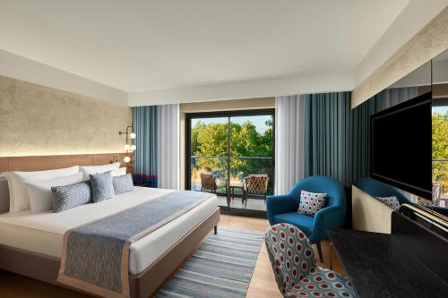En eller flere senge i et værelse på Akra Fethiye The Residence Tui Blue Sensatori - Ultra All Inclusive - Adults Only