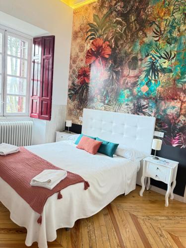 Postel nebo postele na pokoji v ubytování Casa Jardín El Colmenar