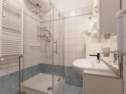 A bathroom at San Giovanni Apartment with Balcony