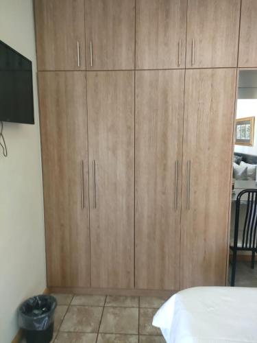 TV/Unterhaltungsangebot in der Unterkunft Leopard Tree Guesthouse