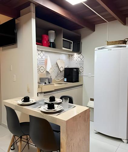 Dapur atau dapur kecil di Solar Água Apartaments