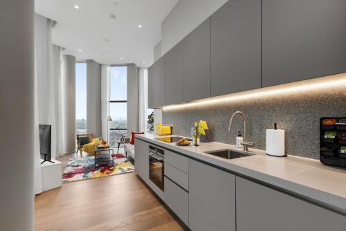 a kitchen with a sink and a counter top at ShyTower in London