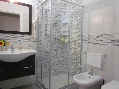 a bathroom with a shower and a sink at B&B Eco Dal Mare in Gallipoli