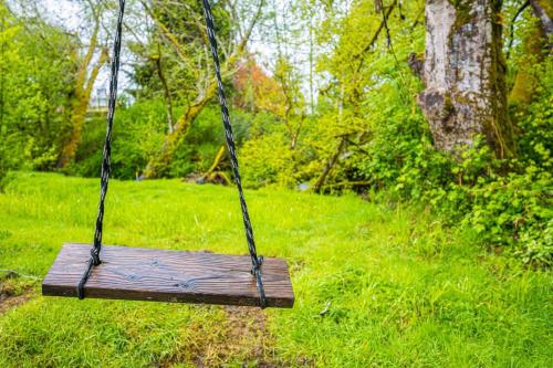 Jardín al aire libre en Rainforest Tiny Home Retreat 19