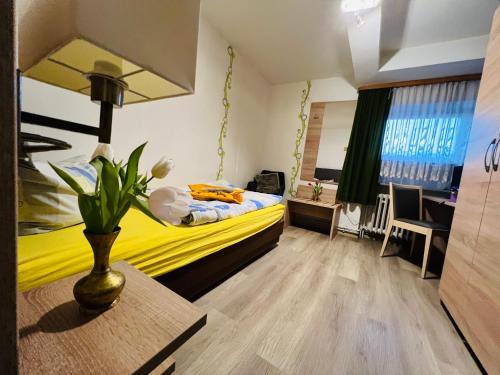 Postel nebo postele na pokoji v ubytování Hotel Steinhoff