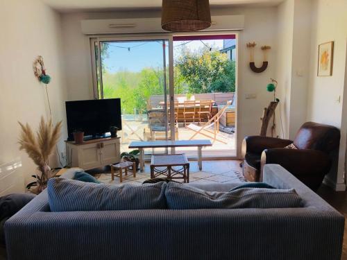 Photo de la galerie de l'établissement Maison avec jardin et piscine, à Arbonne